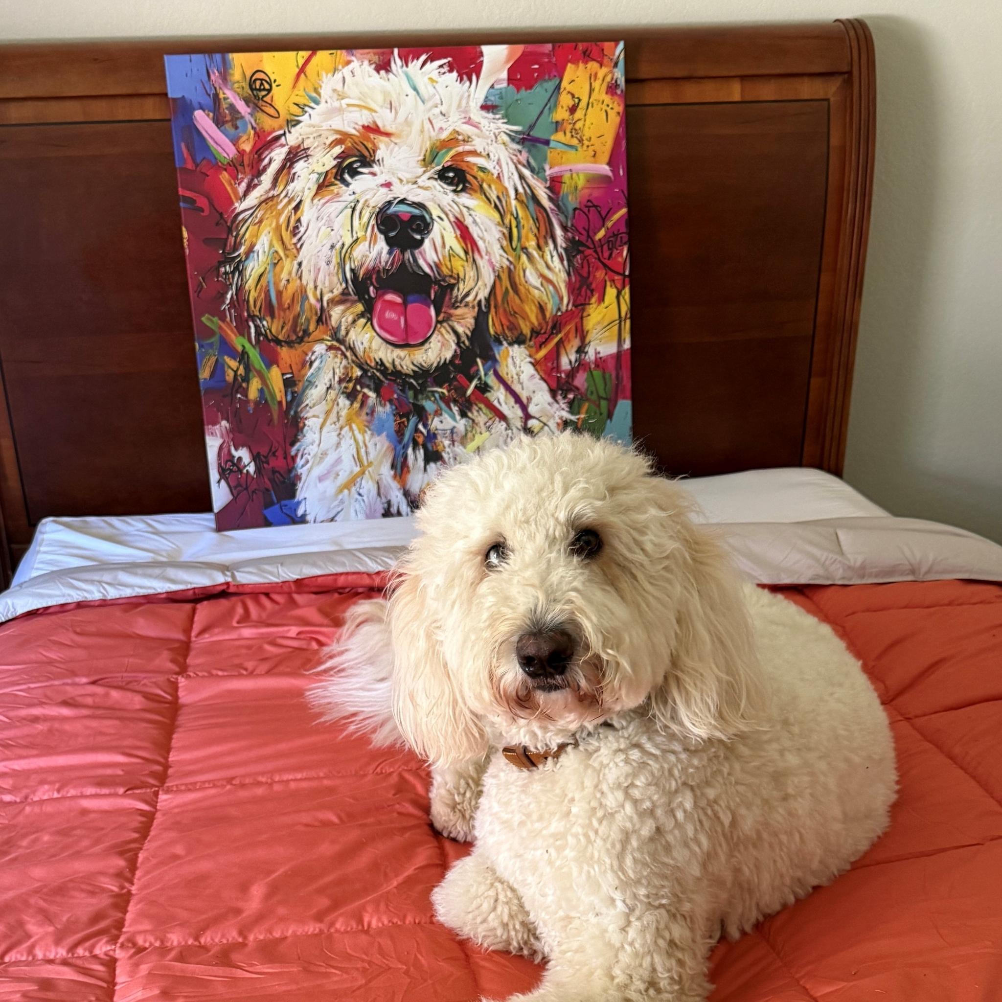 White dog sitting on a bed with a colorful painting of a dog in the background